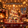 Lighted Christmas village tree with glowing miniature houses on a mantel