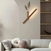 Wood vase wall light in a bedroom