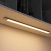 Motion sensor light bar mounted under a cabinet