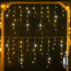 Outdoor curtain lights hanging warm white along a house roofline - photo 3