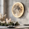 Close-up of the Lunar moon wall sconce texture and glow