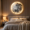 Lunar wall sconce lighting a hallway at night