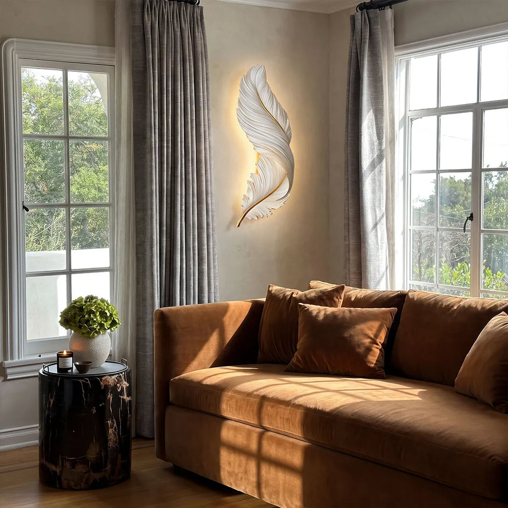 LED wall art feather wall light, beside a living room window
