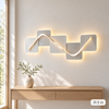 31.5 inch geometric LED wall art above a console table