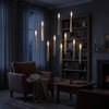 Floating LED candles hanging in a living room