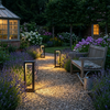 Three 11.8 inch rectangular frame bollard lights along a gravel garden path