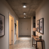 Three LED surface mount ceiling spot lights in a hallway, neutral white