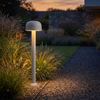 Snow gray mushroom pathway light 30.1 in at a gravel path edge