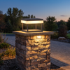 Type B solar post cap light 9.8 in on a stacked stone pillar