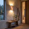 Natural stone wall sconce in an entry hall