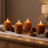 Flameless pinecone candles glowing on a wooden mantel with autumn decor