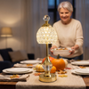 Gold art deco crystal lamp glowing on a Thanksgiving dinner table