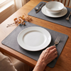 Gray leather placemats with dinner plates