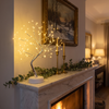 LED tree lamp glowing on a Christmas mantel