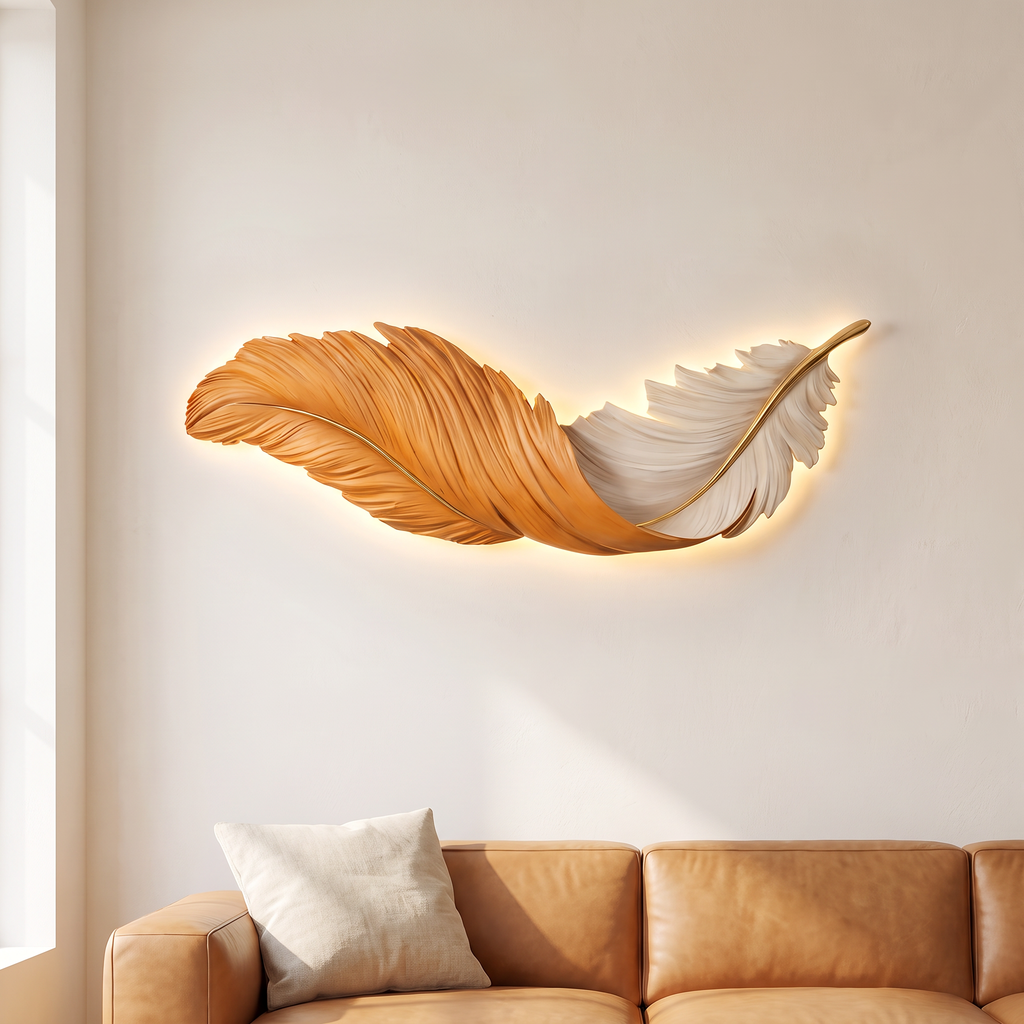 LED wall art feather wall light, orange and white, hung horizontally above a sofa