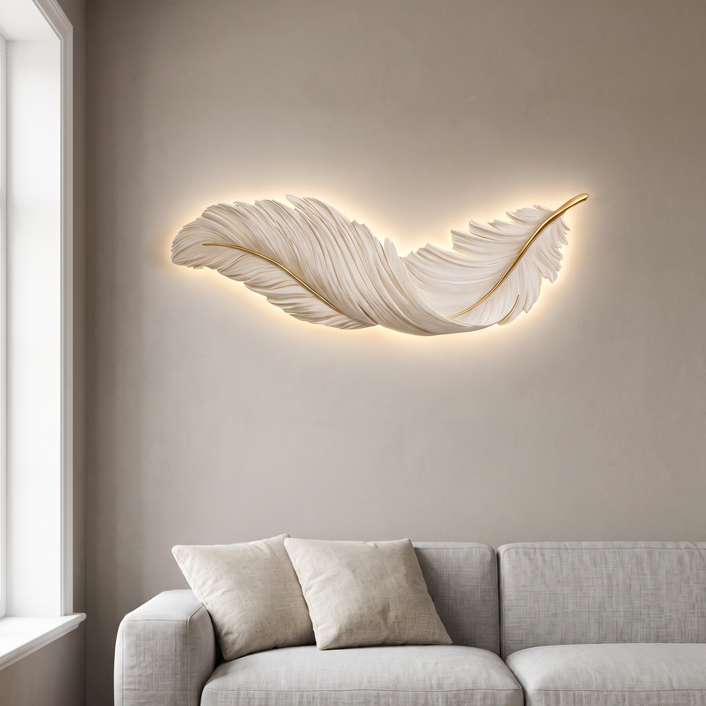 LED wall art feather wall light, white, hung horizontally above a sofa