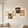 Geometric wall art with LED backlight, style B walnut and beige panels, above a sofa