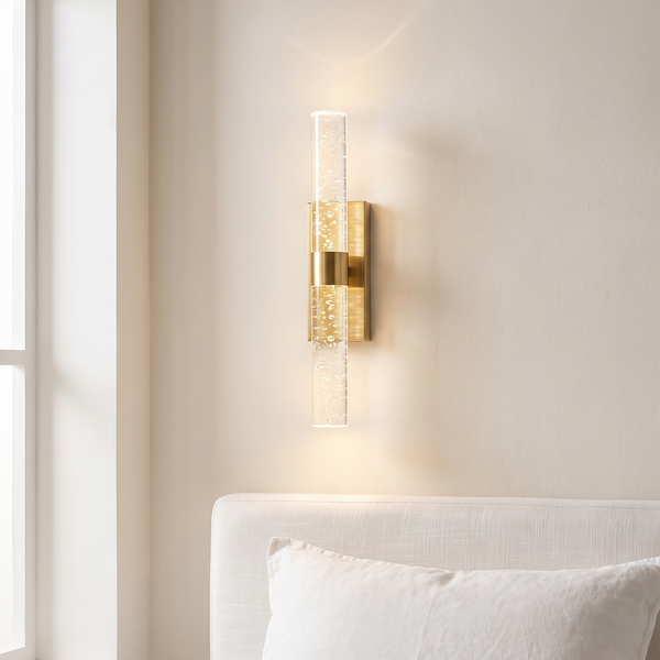 Crystal wall sconce, cordless bubble glass wall lamp, beside a bed