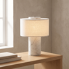 Travertine table lamp, white marble base with fabric shade, cordless, on a console
