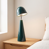 Cordless table lamp, rechargeable cone lamp, green, on a nightstand