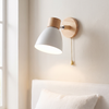 Pull chain wall sconce, white, Scandinavian wall light beside a bed