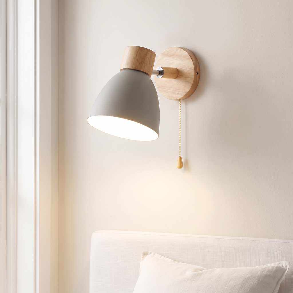 Pull chain wall sconce, gray, Scandinavian wall light beside a bed