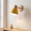 Pull chain wall sconce, yellow, Scandinavian wall light with wood backplate