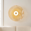 Glass plug in wall sconce, amber art glass, living room