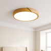 Modern flush mount ceiling light, round LED, yellow rim, wood accent