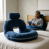 Reading pillow with arms in use on a bed, Navy Blue