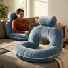 Reading pillow with arms in use on a bed, Light Blue
