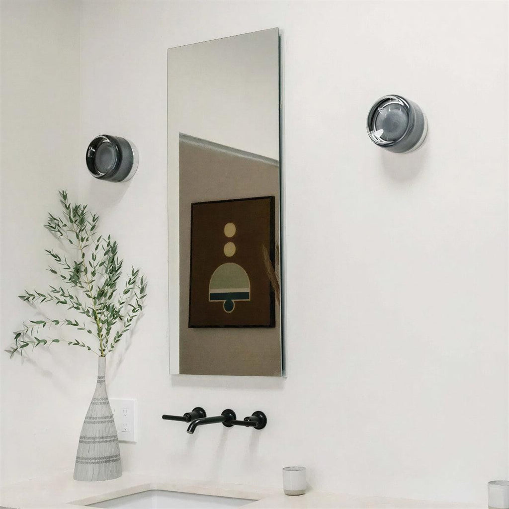 Round dimple wall light in a hallway