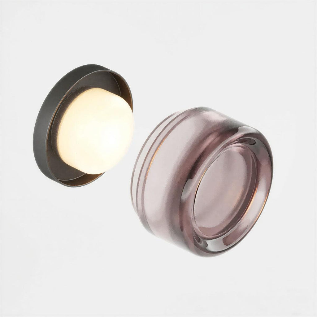 Compact dimple sconce scale reference on a wall