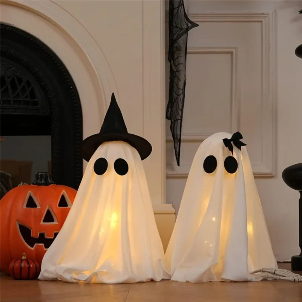 Ghost figure with pointed witch hat, white draped fabric