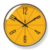 Nordic wall clock with black frame and burnt orange face