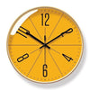 Nordic wall clock with gold frame and orange face