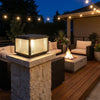 Square solar pillar light on a stone patio column at night