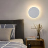 Round white LED wall light, low profile modern sconce