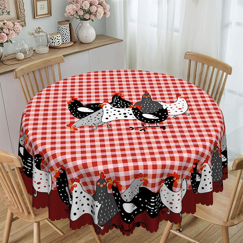 Round red plaid rooster tablecloth on a round dining table